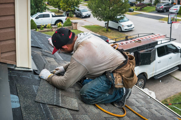 Professional Roofing technician working in Sloan, NY